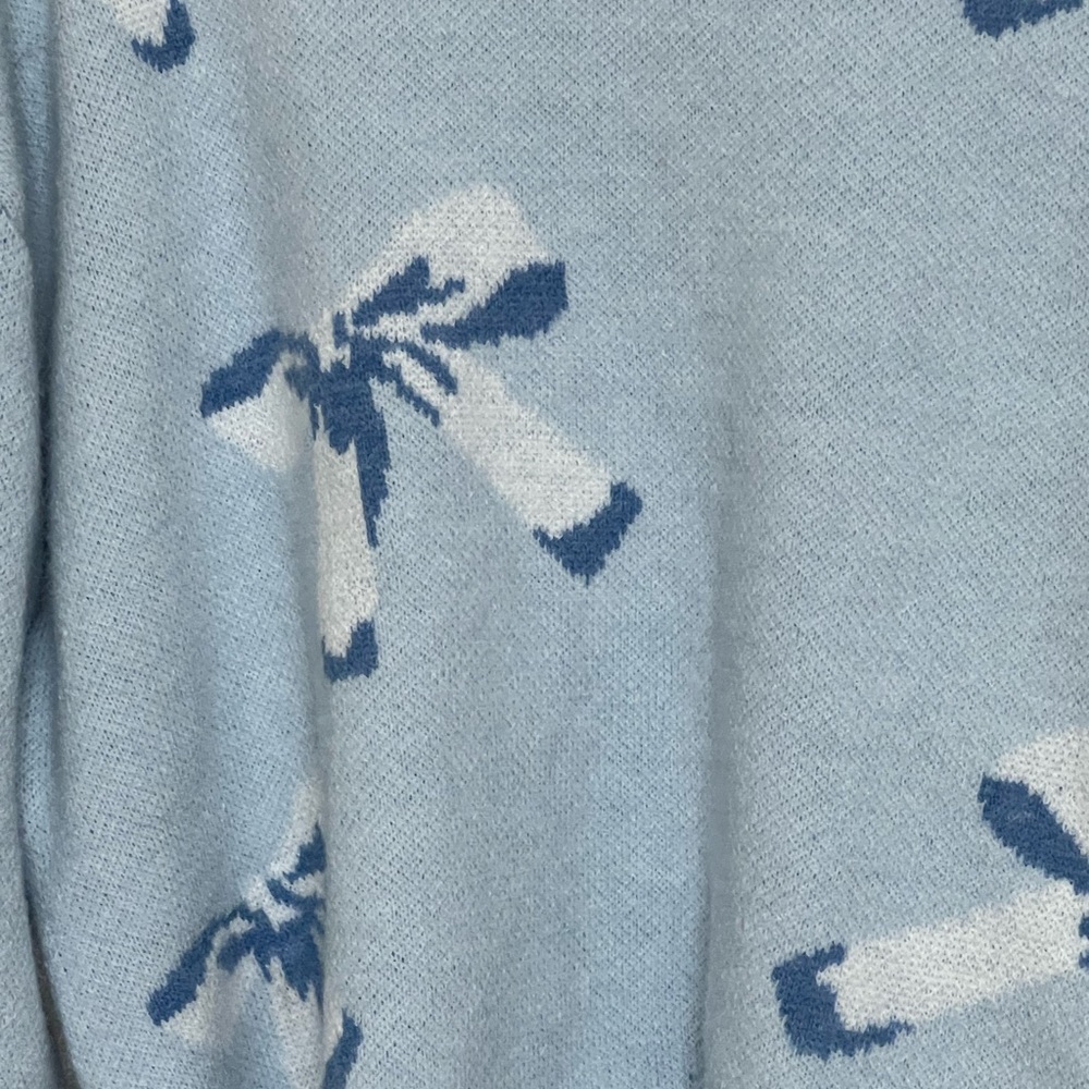 NWOT Women’s Whimsical Blue and White Crew Neck Sweater with Bow Motif. - Picture 2 of 4
